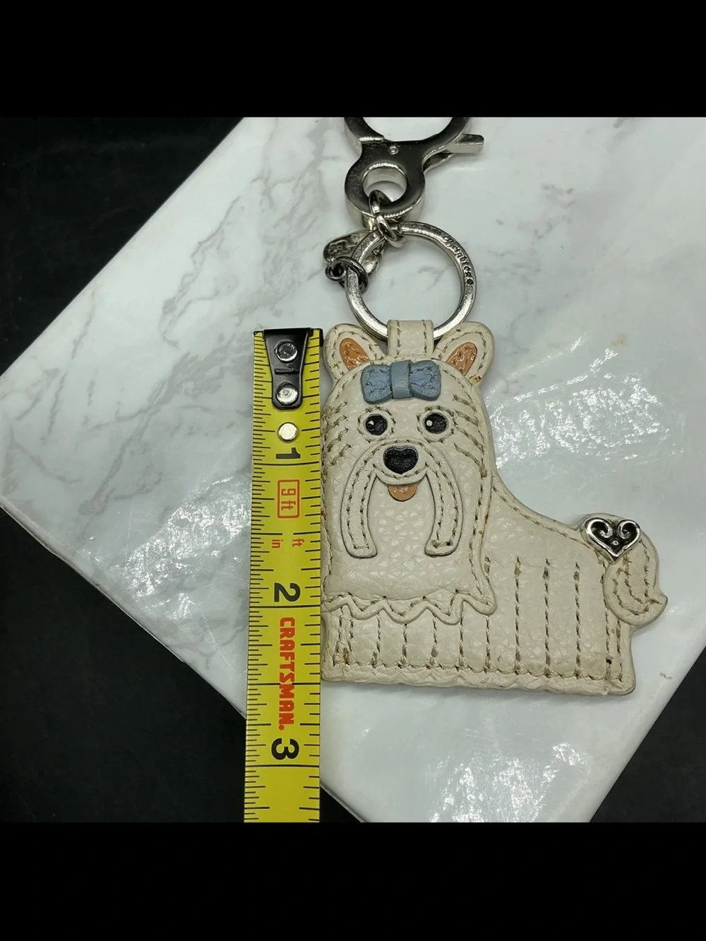 Brighton Cream Leather Dog Key Charm with Blue Bow